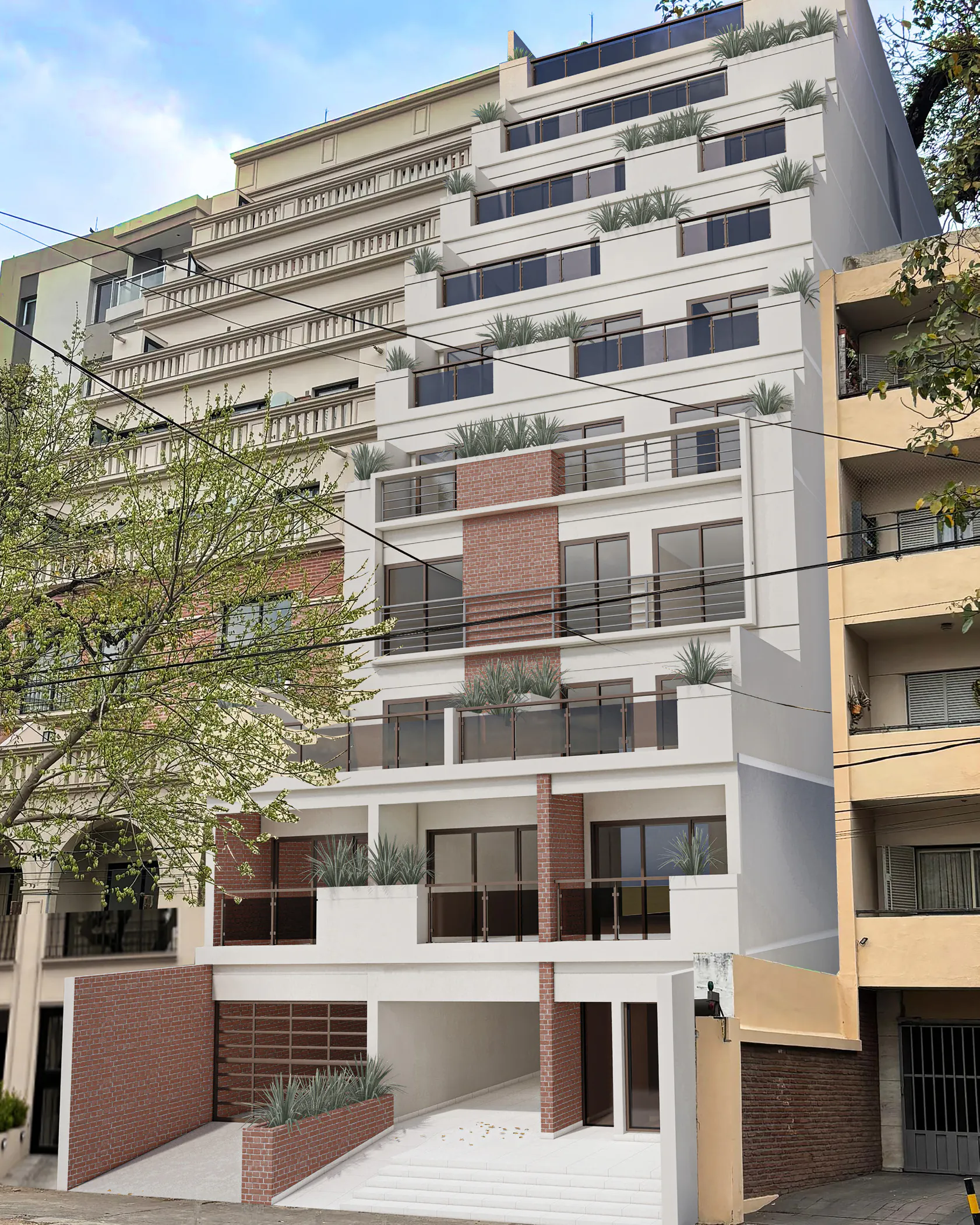 Fachada del edificio sobre la avenida: frente blanco de ocho niveles con balcones de baranda metálica, paños de ladrillo visto y maceteros con plantas, que se escalona hacia arriba, entre edificios vecinos y con un árbol en la vereda