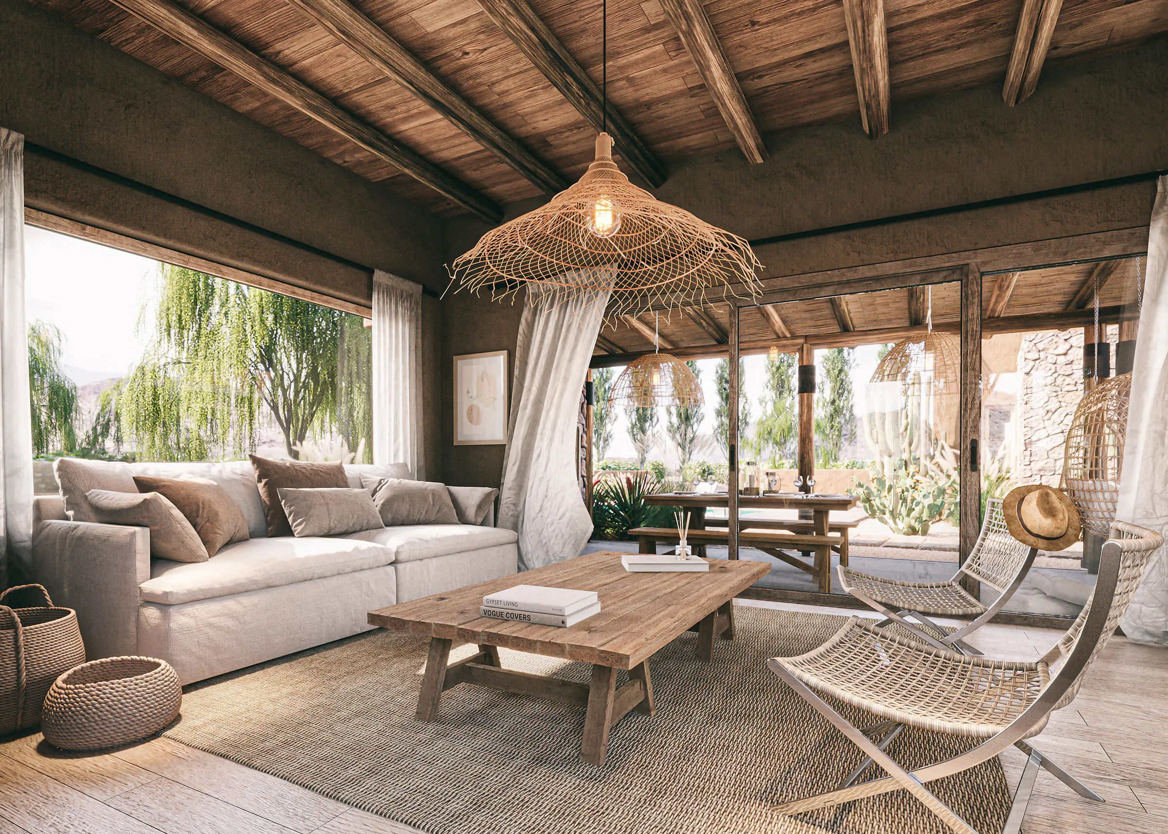 Living con techo de vigas de madera, sillón de lino, mesa baja de madera, lámpara colgante de fibra, dos sillones de cuerda con estructura metálica y ventanal a los sauces; al fondo, una galería con mesa larga y una silla colgante