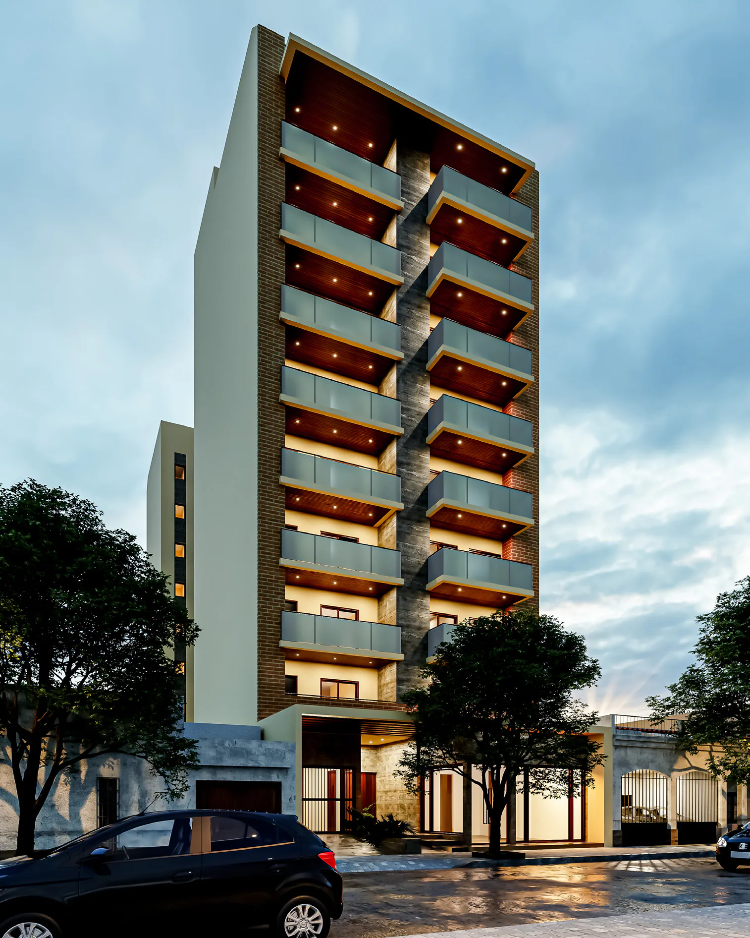 Render al atardecer de P788 visto en diagonal desde la calle: torre angosta con balcones de barandas de vidrio y cielorrasos iluminados, una franja central revestida en piedra, árboles en la vereda y un auto oscuro estacionado, bajo un cielo nublado