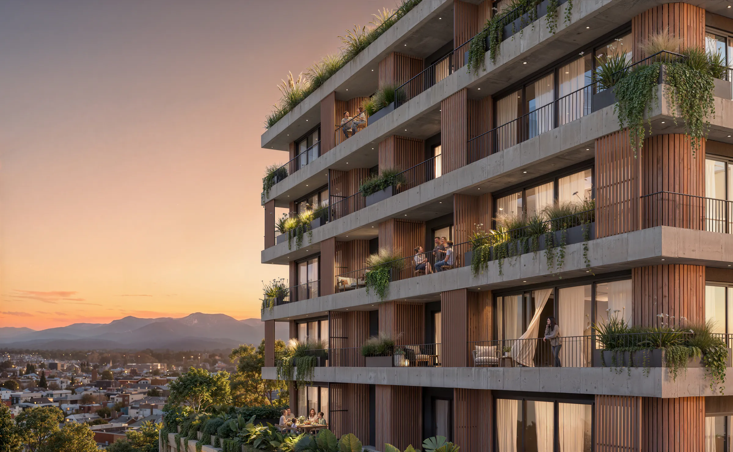 Torre Veinte al atardecer, con los balcones verdes y una cadena de cerros de fondo (imagen ilustrativa)